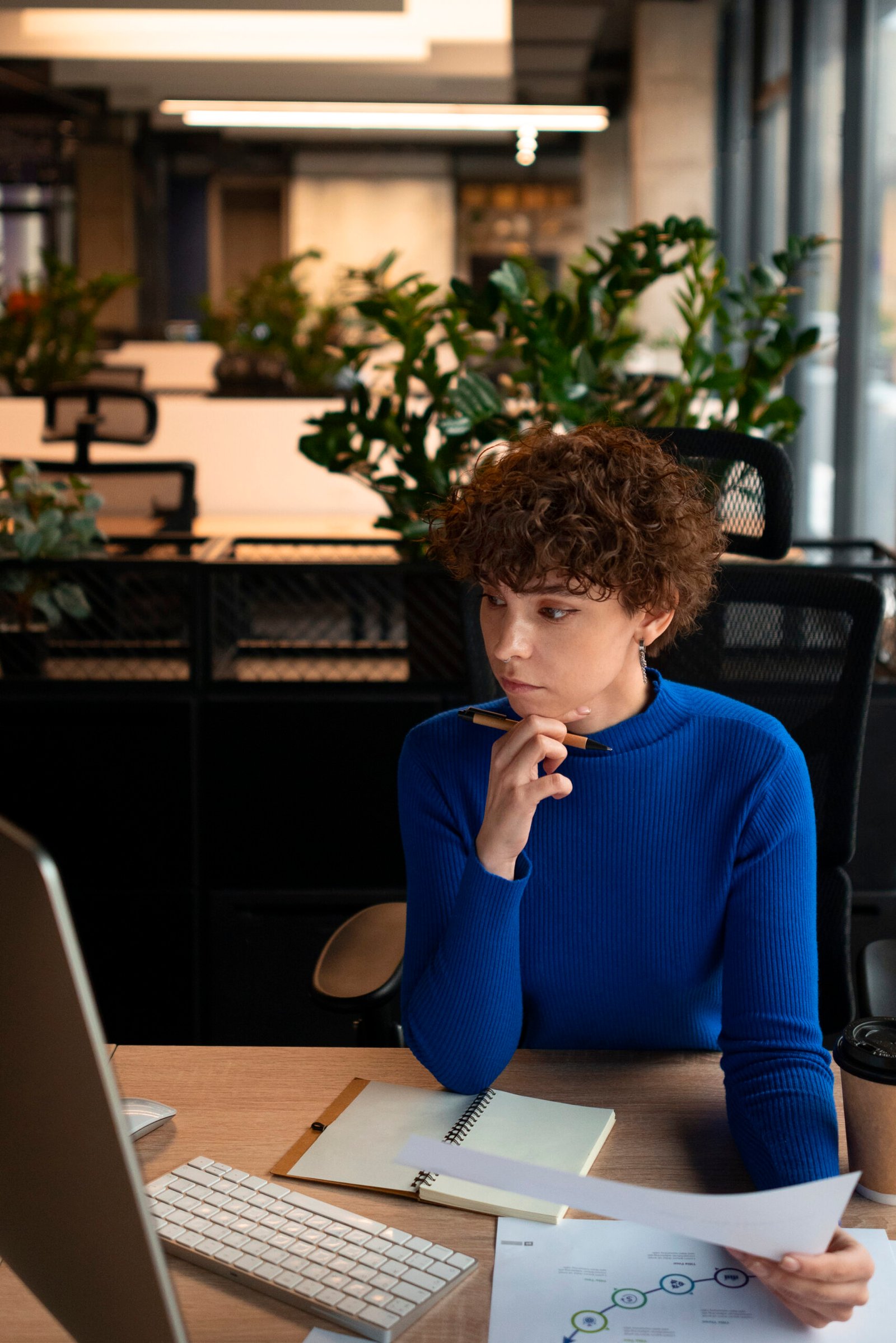 SnS: Young lady working on a business plan.
